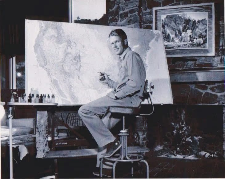 Hal Shelton painting a large-scale shaded relief map in his Golden, Colorado studio